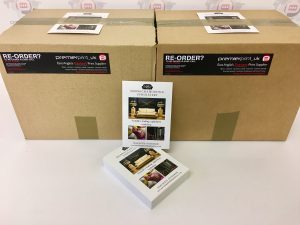 Box of printed flyers for Norwich & Norfolk Upholstery printed by Premier Print UK